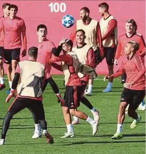  ?? REUTERS PIC ?? Real Madrid players train at the Valdebebas ground in Madrid yesterday.