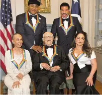  ?? KEVIN WOLF/THE ASSOCIATED PRESS ?? Front row from left, 2017 Kennedy Center Honorees Carmen de Lavallade, Norman Lear, and Gloria Estefan; back row from left, LL Cool J and Lionel Richie following the State Department dinner for the Kennedy Center Honors on Saturday in Washington.