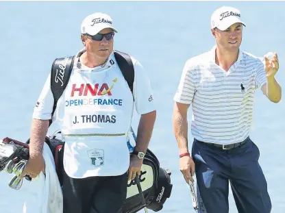  ??  ?? Justin Thomas, right, with his caddie at Le Golf National for the French Open which starts today