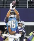  ?? Michael Ainsworth ?? The Associated Press Chargers wide receiver Tyrell Williams catches a 26-yard touchdown pass against Cowboys cornerback Anthony Brown in the third quarter of Los Angeles’ 28-6 win Thursday at AT&T Stadium.
