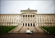  ?? AP Photo/PEtEr MorrIson ?? In this 2017 file photo, a road sweeper van passes Stormont, Belfast, Northern Ireland.