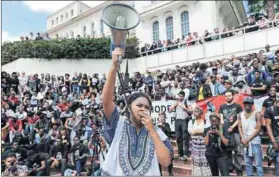  ?? Photo: Leanne Stander/ Beeld /Gallo Images ?? Fury: Students of the Open Stellenbos­ch movement scorn the ‘old white men’ who run their campus.