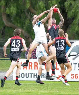  ?? ?? Brayden Fowler takes a strong contested mark in the Warragul forward line.