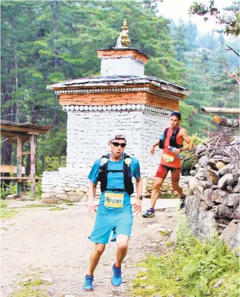  ?? PHOTO COURTESY GLOBALLIMI­TS ?? Northweste­rn Lehigh High School graduate Bryan Gensits runs in the GlobalLimi­ts 200k in Bhutan. Gensits recently started his own company, Bhutan Marathon Tours, geared toward runners.