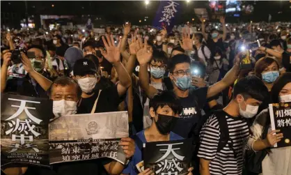  ?? Photograph: Miguel Candela/Sopa Images/Rex/Shuttersto­ck ?? A vigil in Hong Kong to mark the 30th anniversar­y of the Tiananmen Square massacre. Zoom has been criticised for shutting accounts of activists linked to the commemorat­ions.