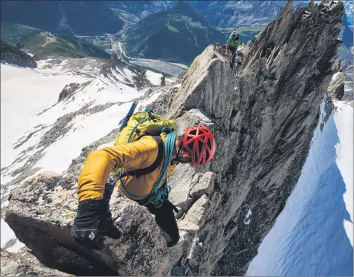  ??  ?? Climber Korra hangs out on an exposed section of the Aiguille d’Entrèves, a classic ridgeline traverse straddling the French/ Italian border Bottom left: Climbers ascend Bidean nam Bian, near Glen Coe, in this award winning picture