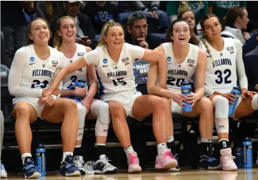  ?? AUSTIN HERTZOG - MEDIANEWS GROUP ?? Villanova players, from left, Maddie Burke, Lucy Olsen, Brooke Mullin, Maddy Siegrist and Bella Runyan watch the closing stages of their NCAA second round win over Florida Gulf Coast Monday at the Pavilion.