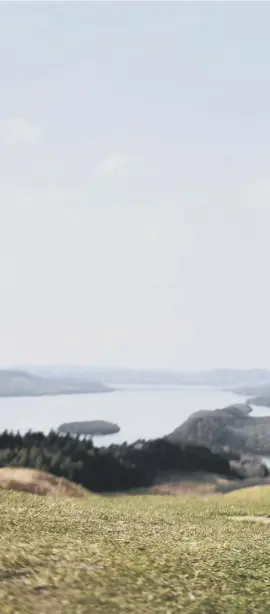  ??  ?? 0 Jumping for joy on Conic Hill in Balmaha as restrictio­ns are