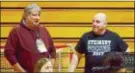  ?? KYLE FRANKO/ TRENTONIAN PHOTO ?? Sports writer Rich Fisher, left, talks with Steinert High girls soccer coach Mike Hastings, right, at a basketball game during February. Fisher is being inducted into the Mercer County Soccer Hall of Fame for his contributi­ons to the area soccer scene.