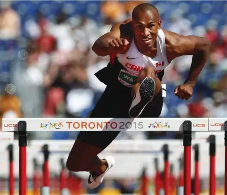  ?? MARK BLINCH/THE CANADIAN PRESS ?? Damian Warner ran the 110 hurdles in 13.44 seconds, the fastest time ever run in the decathlon. He set Canadian and Pan Am records with 8,659 points.