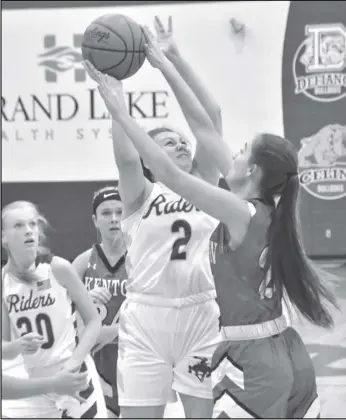  ?? Staff photo/Jake Dowling ?? St. Marys’ Haley Felver attempts a contest shot during the first half of a Western Buckeye League girls basketball game on Thursday against Kenton.