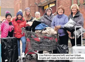  ??  ?? Lisa Patnick (second left) and her Urban Angels get ready to hand out warm clothes