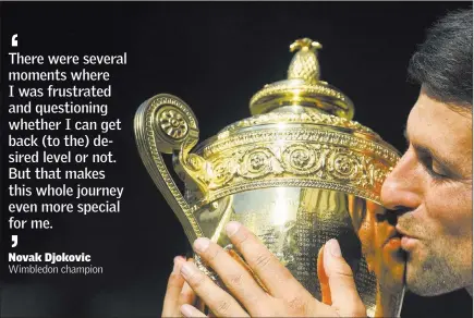  ?? Neil Hall ?? The Associated Press Novak Djokovic of Serbia kisses the Wimbledon men’s singles trophy after defeating South Africa’s Kevin Anderson on Sunday.