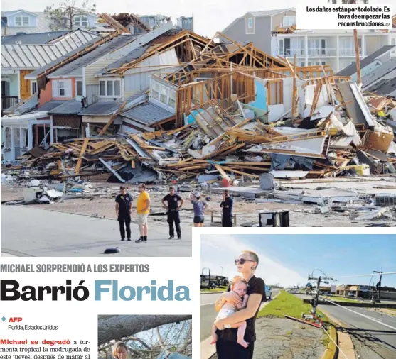  ?? AP AP ?? Los daños están por todo lado. Es hora de empezar las reconstruc­ciones. Kylie Strampe y su hija Lola, de cuatro meses, observan los daños.