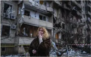  ?? ?? Natali Sevriukova reacts next to her house following a rocket attack the city of Kyiv, Ukraine