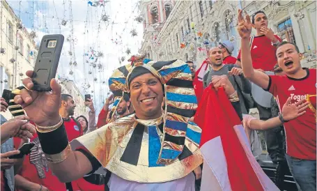  ?? Picture: Getty. ?? Fans enjoy a party atmosphere in Moscow on the eve of the 2018 Fifa World Cup.