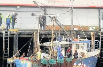  ??  ?? > Mark Arries, 26, top right, and Edward Ide, 21, bottom right, were found dead on the fishing vessel Eshcol