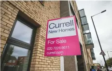  ?? Bloomberg ?? An estate agent’s ‘For Sale’ sign outside an apartment block in London. The pound’s weakness over the last 12 months has encouraged dollar-pegged investors to invest in London.