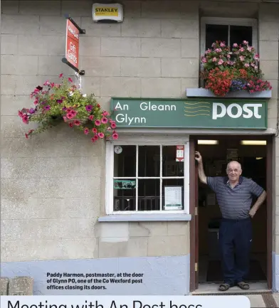  ??  ?? Paddy Harmon, postmaster, at the door of Glynn PO, one of the Co Wexford post offices closing its doors.