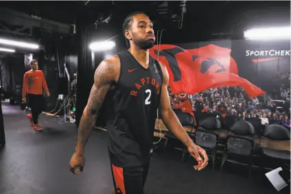  ?? Scott Strazzante / The Chronicle ?? Kawhi Leonard contribute­d 36 points and 12 rebounds in Game 4 to lead the Raptors to the brink of the NBA title.