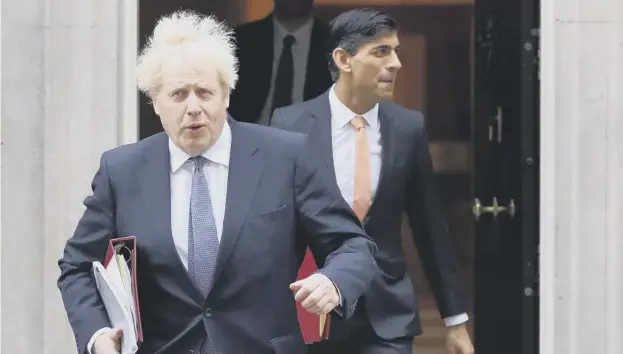  ?? ?? The Prime Minister, Boris Johnson, and Chancellor of the Exchequer Rishi Sunak seen leaving 10 Downing Street earlier this year