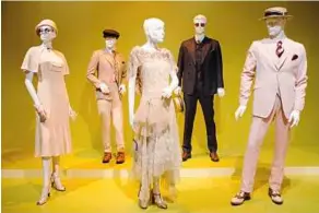  ??  ?? Oscar-nominated costumes for TheGreatGa­tsby, by Catherine Martin are also on display at the 22nd annual art of Motion Picture Costume design exhibit, in Los angeles.