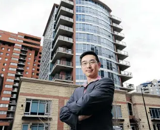  ?? Leah Hennel/Calgary Herald ?? Architect Steven Ho designed the 11-storey Oscar condominiu­m in Eau Claire.