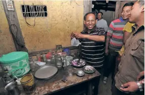  ?? ?? COUNTRY LIQUOR BEING SOLD in the outskirts of Imphal city.