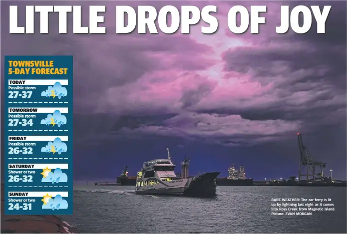  ?? Picture: EVAN MORGAN ?? RARE WEATHER: The car ferry is lit up by lightning last night as it comes into Ross Creek from Magnetic Island.