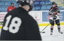  ?? BERND FRANKE ST. CATHARINES STANDARD ?? The Niagara Falls Canucks players work on passing in a drill at team practice Monday night at Gale Centre .