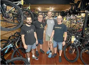  ?? PHOTOS: ANDY JACKSON/STUFF ?? Staff at New Plymouth’s Cycle Inn, from left, Leandro Barbosa Rossetti, owner Robert Coe, Andy Patterson and Mark Bradshaw have been busier than most since the country’s retailers came out of lockdown last week.