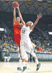  ??  ?? Brittney Martin had 12 points and 11 rebounds in OSU’s loss Wednesday night to Baylor.