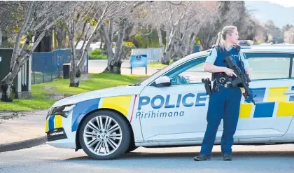  ?? Photo / Matt Brown/top South Media ?? Police at Marlboroug­h Girls’ College yesterday after it was again the target of threats.