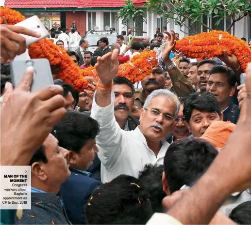  ?? BHUPESH KESHARWANI ?? MAN OF THE MOMENT Congress workers cheer Baghel’s appointmen­t as CM in Dec. 2018