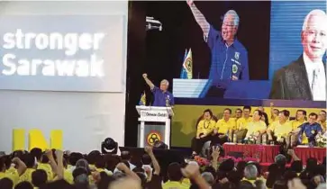  ?? PIC BY NADIM BOKHARI ?? Prime Minister Datuk Seri
Najib Razak speaking at the closing of the Sarawak United Peoples’ Party’s 24th triennial delegates’ conference in Kuching yesterday.