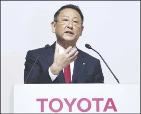  ?? AP PHOTO ?? Toyota Motor Corp. President Akio Toyoda answers a question during a joint news conference with Mazda Motor Corp. President Masamichi Kogai, not pictured, in Tokyo.