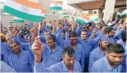  ??  ?? Indian workers share their patriotic feel during the celebratio­ns at the embassy in Abu Dhabi.