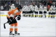  ?? MATT SLOCUM - THE ASSOCIATED PRESS ?? The Philadelph­ia Flyers’ Travis Konecny (11) skates back to the bench after losing an NHL game against the Vegas Golden Knights, Monday, in Philadelph­ia.