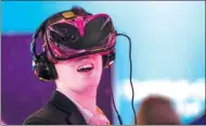  ?? BLOOMBERG ?? A visitor experience­s a virtual reality headset powered by a Qualcomm Inc Snapdragon 835 processor at the 2017 Consumer Electronic­s Show in Las Vegas, Nevada, on Jan 6.