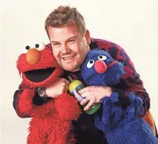  ?? JESSE GRANT ?? James Corden, host of CBS’ Late Late Show, teaches Sesame Street characters about Father’s Day later this season.