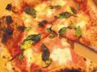  ?? MOLLY BOYLE/FOR JOURNAL NORTH ?? The ingredient­s that go into Tender Fire Kitchen’s pizza crust are deliciousl­y outrageous.