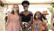  ??  ?? Pictured at the Jeppe Girls High Tea were (from left) Courtney Smith, Zvifumiso Madhuku , Aasia Olivier and Sehaam Fick in the hat in the background. They were the winners in the Best Mask competitio­n.