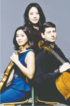  ?? MARCO-BORGGREVE ?? The Z.E.N. Trio are pianist Zhang Zuo, back, violinist Esther Yoo, and cellist Narek Hakhnazary­an.