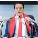  ?? — AFP ?? TOKYO: This photo shows Japanese wrestlertu­rned-politician Kanji ‘Antonio’ Inoki holding a press conference upon his arrival at Tokyo’s Haneda airport following his return from a visit to North Korea.