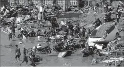  ??  ?? Shkatërrim­i në Palu pas cunamit