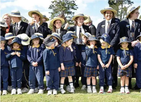  ?? PHOTO: BEV LACEY ?? FAIRHOLME BIRTHDAY: Current Fairholme College students along with staff and Fairholme old girls joined together on the college’s oval to create a “100” for a special aerial photo to celebrate 100 Years.