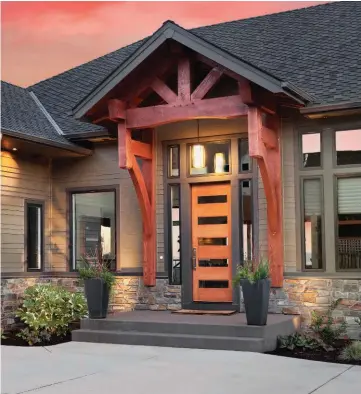  ??  ?? There are plenty of exterior renovation­s, such as a new entryway, that can add value to a home and give it that coveted “wow” factor.