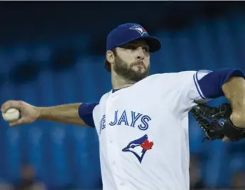  ?? NATHAN DENETTE/THE CANADIAN PRESS ?? Jays starter Brandon Morrow struck out 11 batters and picked up his 10th victory of the season against Twins at Rogers Centre Wednesday. The Jays finished the season with a record of 73-89, good for 4th place in AL East.