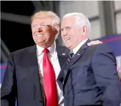  ??  ?? Trump and Pence arrive for a ‘Make America Great Again’ campaign rally at McKenzie Arena, in Chattanoog­a, Tennessee. World leaders will push for the rapid completion of a massive, China-backed trade deal that excludes the US at a summit this week, in a rebuke to rising protection­ism and Donald Trump’s ‘America First’ agenda. — AFP photo