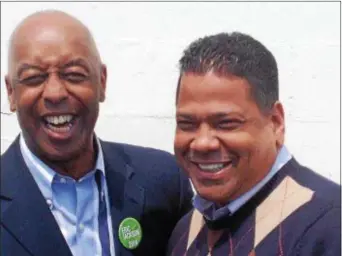  ?? TRENTONIAN FILE PHOTO ?? Trenton Mayor Eric Jackson (left) and Paul Perez meeting before the 2014 mayoral runoff election.